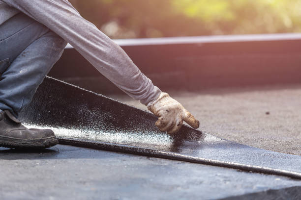 Professional Basement Waterproofing technician working in Wayland, MI